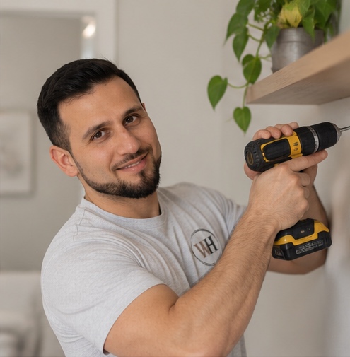 Loghman performing minor carpentry & installations